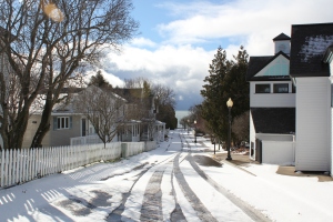 Snowy streets lead to lake at Mackinac Island